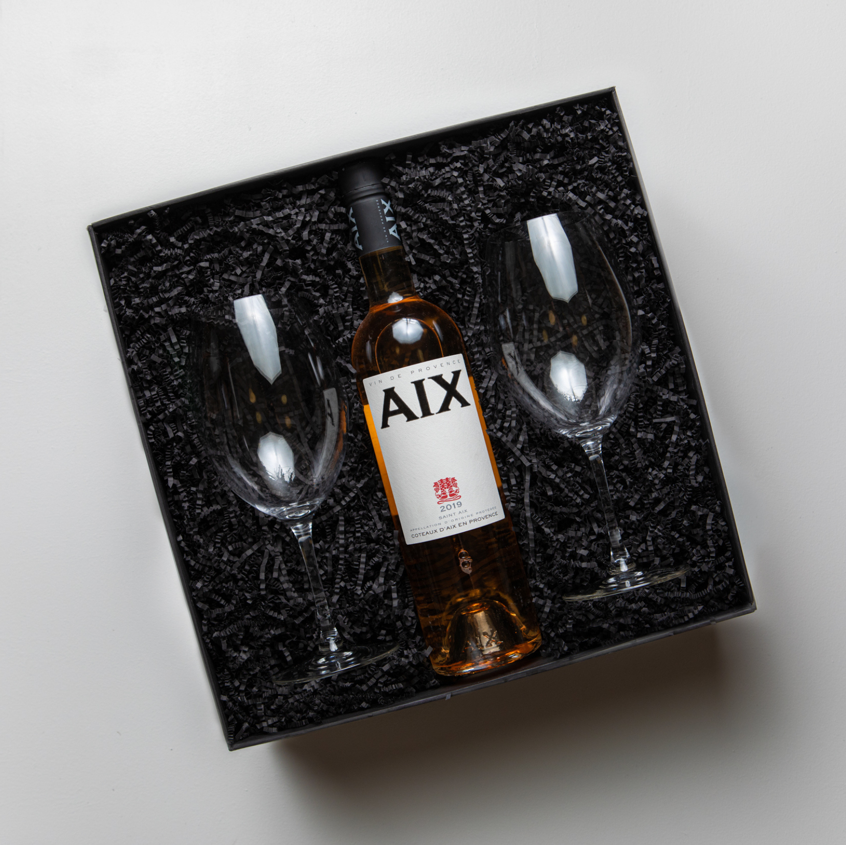 AIX Gift box which includes AIX Rosé and a set of 2 vintage ref wine glasses by Plumm